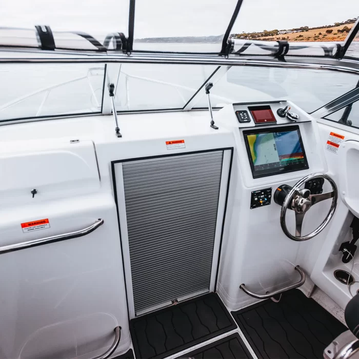 The helm of the Northbank 600C with dash and cabin roller door | Cuddy Cabin | Fishing Boat | Fibreglass Fishing Boat | Northbank Boats