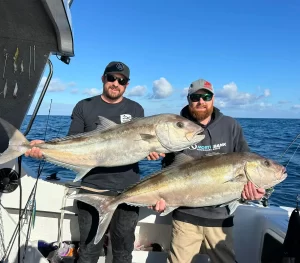 Reds Fishing Adventures holding two Samson fish in a Northbank | Fibreglass Boats | Fishing Boats | Northbank Boats